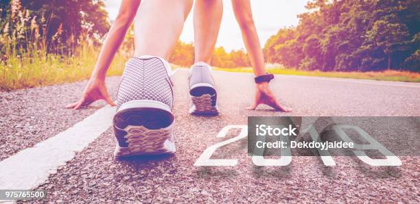 2019 Symbolises The Start Into The New Yearstart Of People Running On Street With Sunset Lightgoal Of Success Stock Photo - Download Image Now