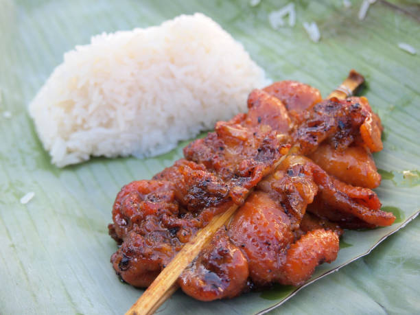 istock Skewer chicken pieces and sticky rice 975769208