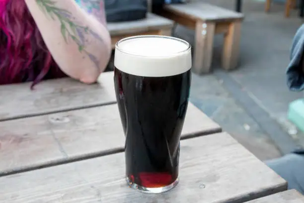 Full pint of Guinness with a head