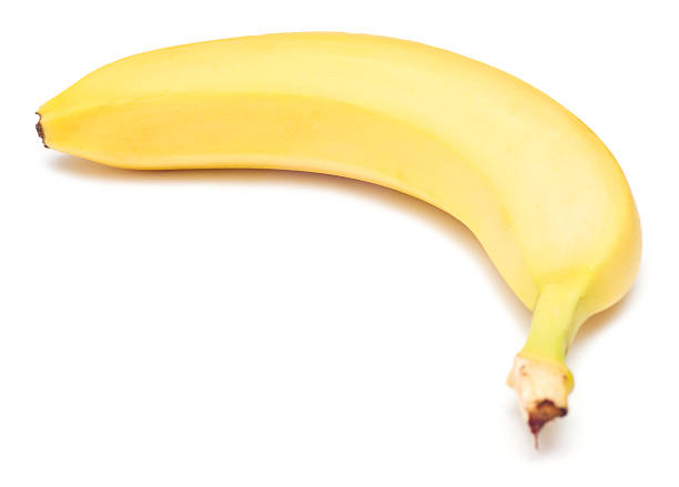 istock A single, yellow banana on a white background 97578263