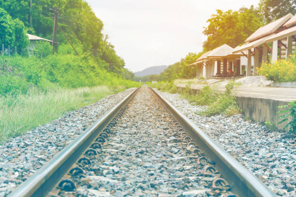 istock railway tracks in a rural scene with nice pastel sunset 975785456