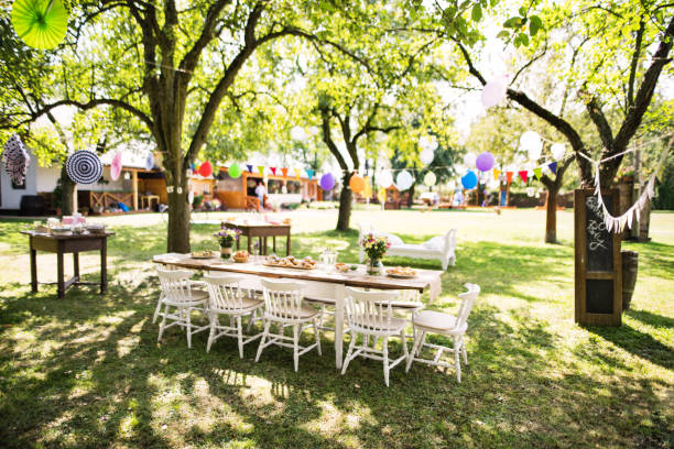 istock Table set for a garden party or celebration outside. 975795816