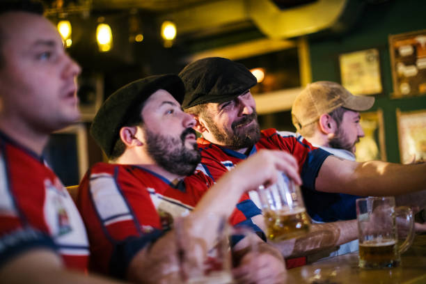 istock Sports fans enjoying the game 975795944