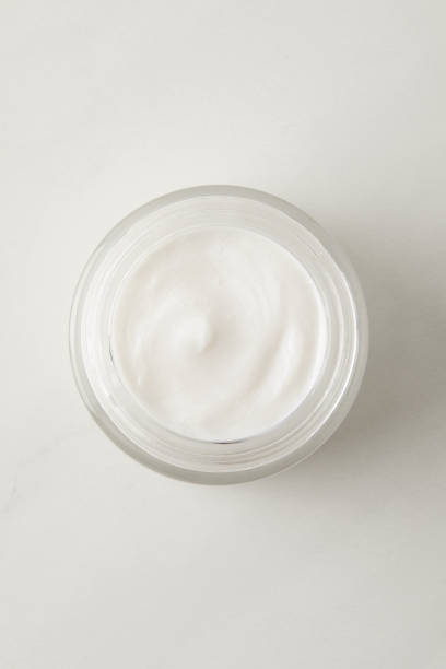 istock top view of organic cream in container on white background 975802148