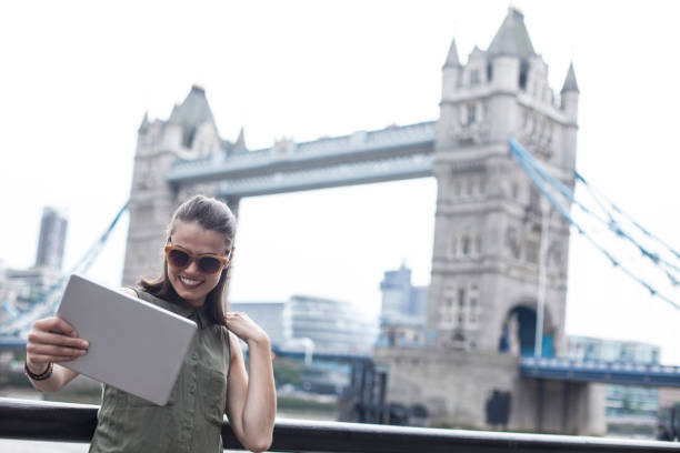 istock Happy woman in London 975806336