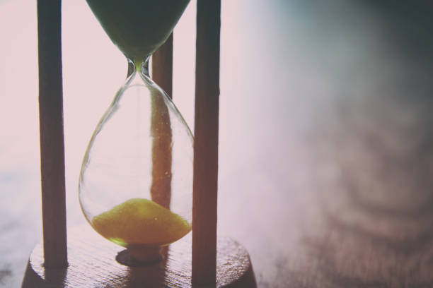 istock Hourglass as time passing concept for business deadline. 975811534