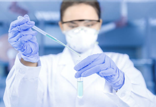 istock Young female scientist working in the laboratory 975812198