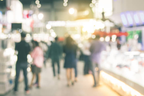 istock Blurry image of shopping mall 975847100