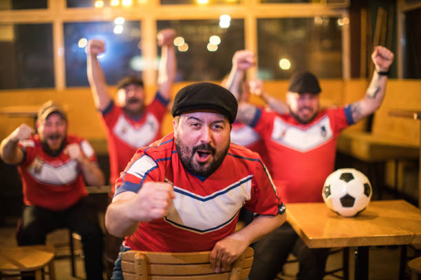 istock Male sport fans 975847552