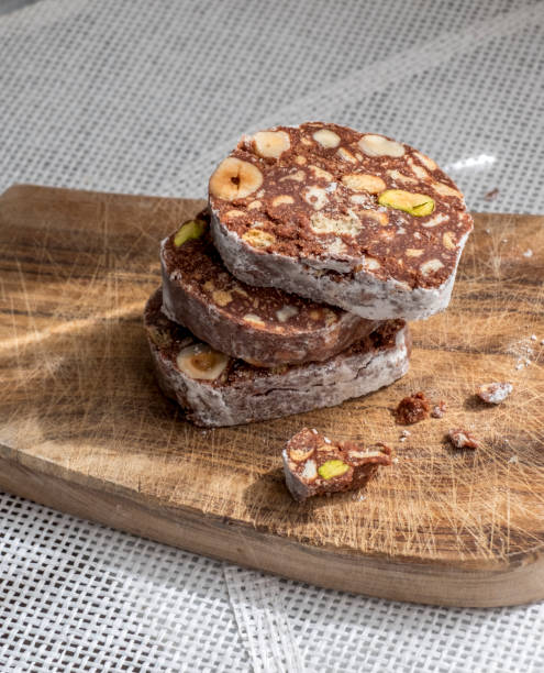 istock slices of chocolate dessert with hazelnuts and pistachios 975852174