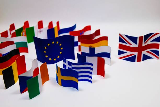 istock Multi colorful flags of EU countries for BREXIT concept. 975853862