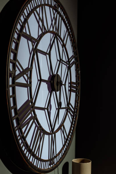 istock big vintage wall clock in modern green room 975854262