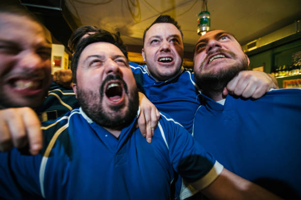 istock Sport fans going crazy over winning 975865792
