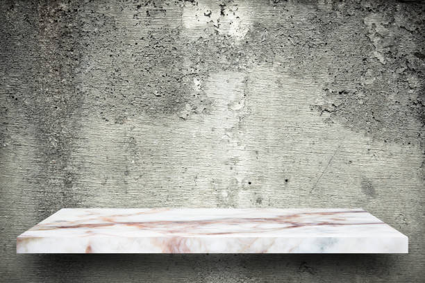 istock Empty top marble shelves and stone wall background / for product display montage product display 975876540