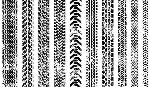 wektory grunge gąsienice opon - tire track tire track pattern stock illustrations