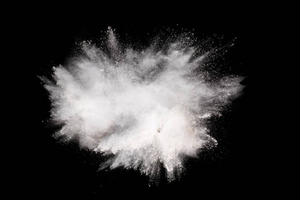 istock Launched white powder splash on black background. Bizarre forms of of white powder explosion cloud against dark background. 975887270