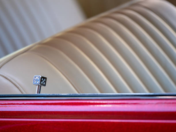 istock Decorative, novelty dice car door lock on a lowrider with leather seats 975902088