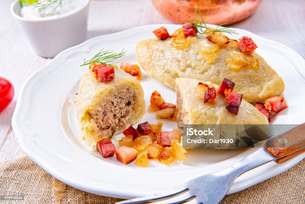Rustic Cepelinai, a specialty Lithuanian and Polish cuisine. Lithuania Stock Photo