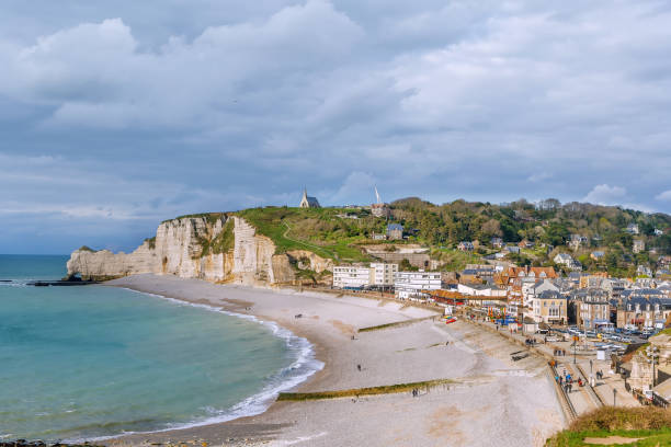 istock Cliffs in Etretat, France 975963040