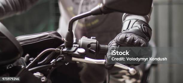 Moto Gloves And Motorcycle Close Up Stock Photo - Download Image Now - Motorcycle, Glove, Sports Glove