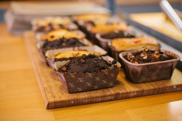 istock Many mafins on the counter in a bakery or in a cafe 976002130