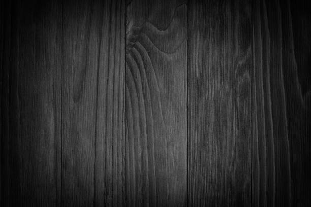 istock black wooden background or gloomy wood grain texture 976005764