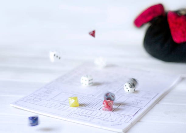 Role playing rolling dices - fotografia de stock