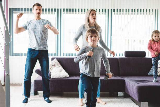 istock Dancing competition going on in this family home 976027018