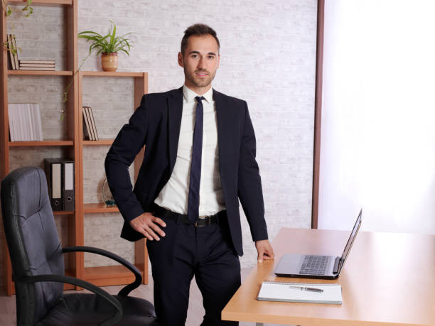 istock businessman satisfied in his work. 976027344