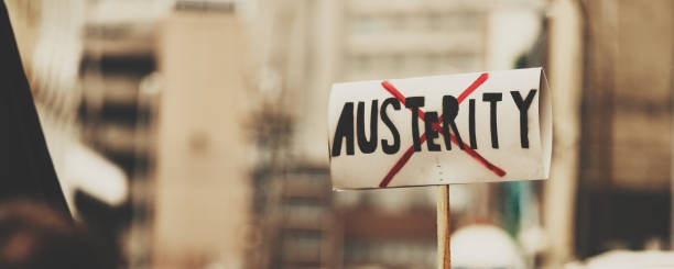 Protesting Austerity Public protest in city square. budget cut stock pictures, royalty-free photos & images