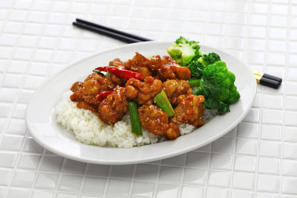 istock general tso’s chicken with rice, american chinese cuisine 976044178
