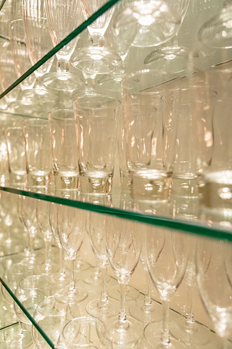 Shelf full of various wine glasses, full frame