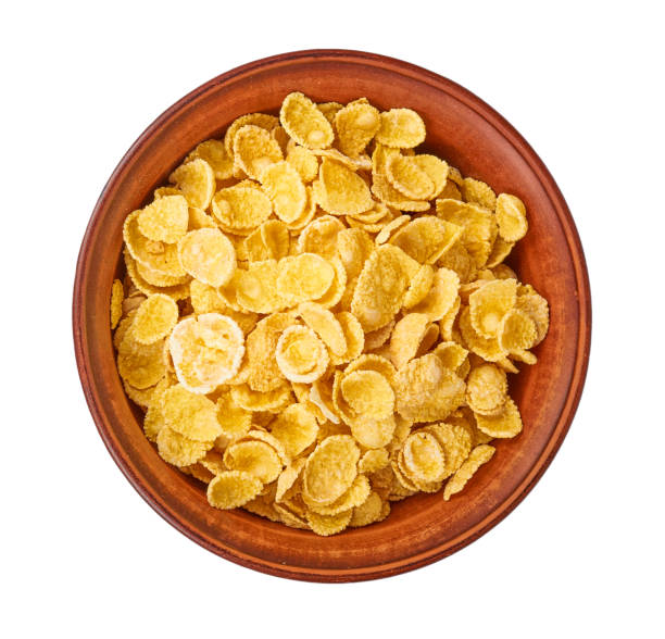 istock bowl of corn flakes isolated on white background 976076564
