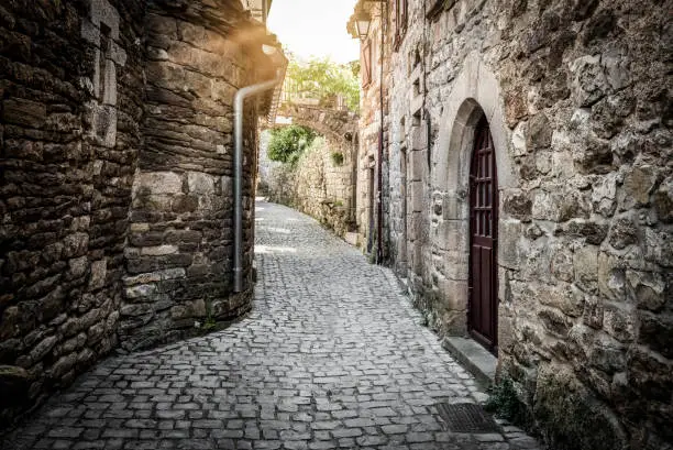 Narrow alleyway in the village of Naves, France