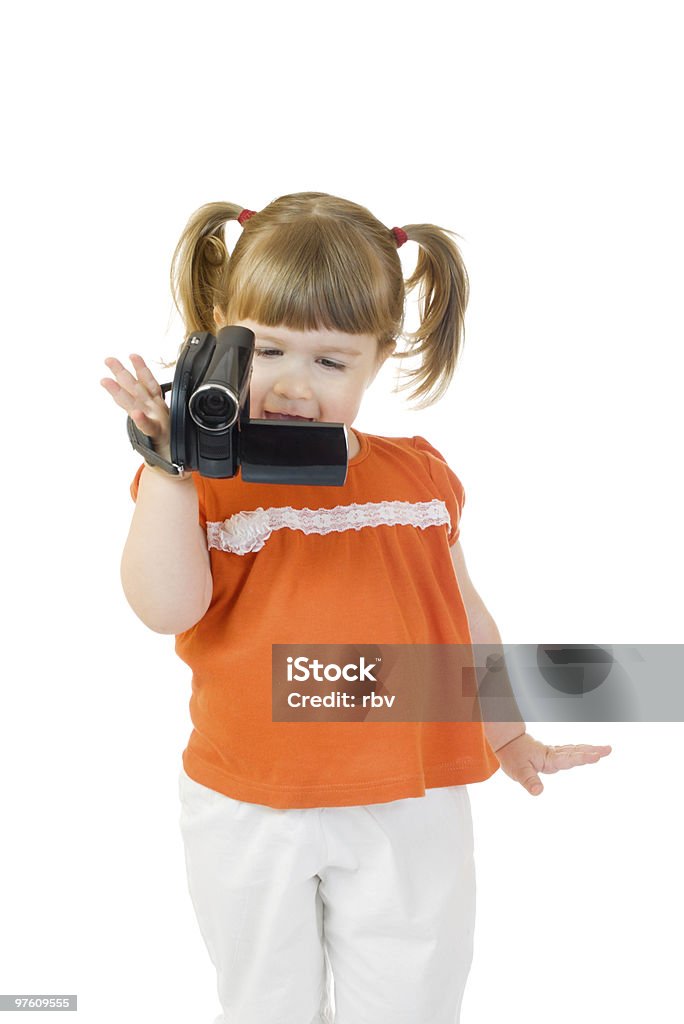 Linda menina com camcoder - Foto de stock de Assistindo royalty-free