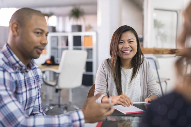 istock Colleagues discussing business at the conference table 976096062