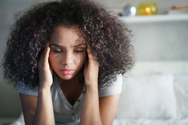 istock Depressed Hispanic Girl With Sad Emotions And Feelings 976103790