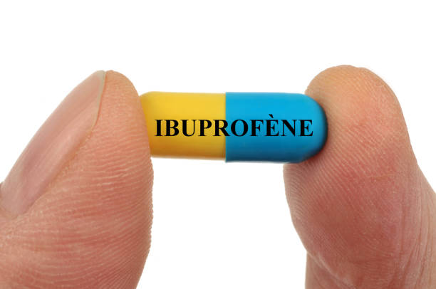 gélule d'ibuprofène - ibuprofen stock-fotos und bilder