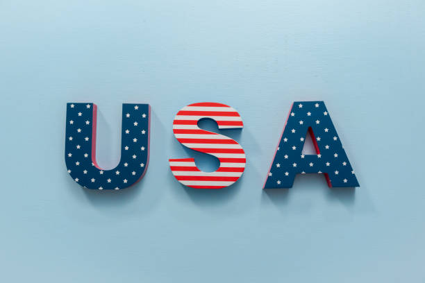 istock Painted USA sign with white, red and blue on blue background. 976155878