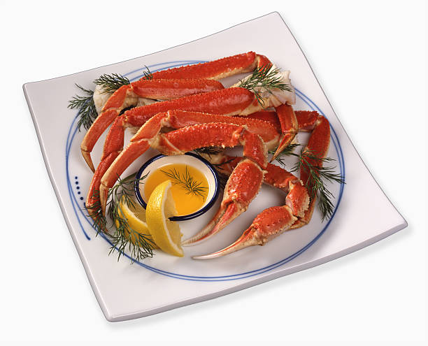 istock Platter of King Crab Legs with Butter and Lemon 97617695