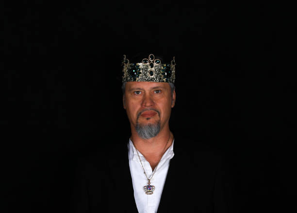 istock portrait of a king with a crown on a black background 976178572