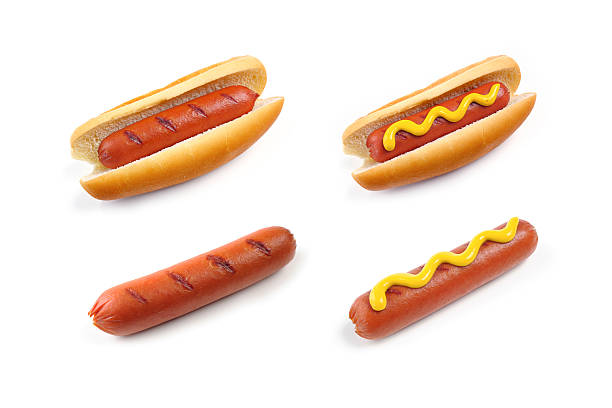 istock Four hot dogs with and without buns and mustard on white 97618031