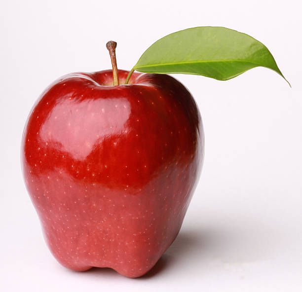 Fresh Red Apple with Green Leaf stock photo