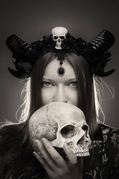 istock Horned girl with skull 976189414