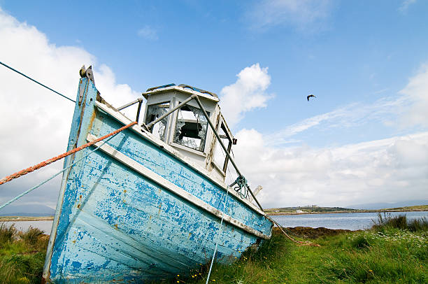 Fishing boat on the dry in Connemara stock photo