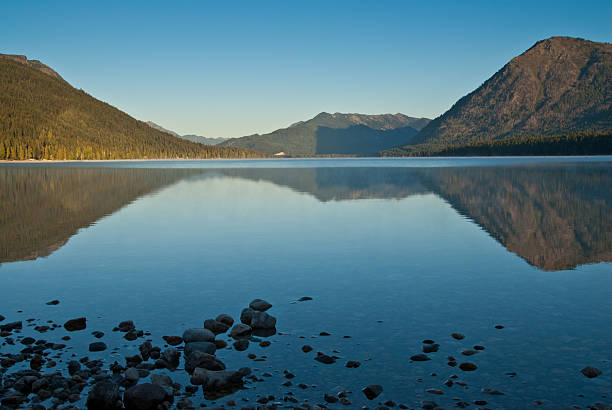 istock Dirtyface Peak and Trees Reflected in a Lake at Sunrise 97624204