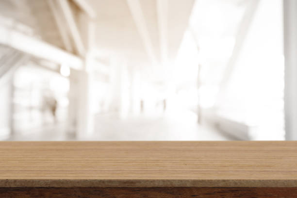 istock Perspective empty wooden table on top over blur background, can be used mock up for montage products display or design layout. 976262284