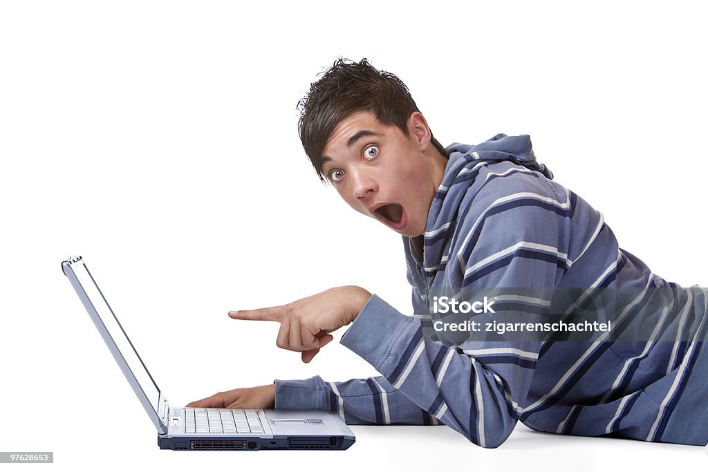 young male student found something surprising on internet computer  Computer Monitor Stock Photo
