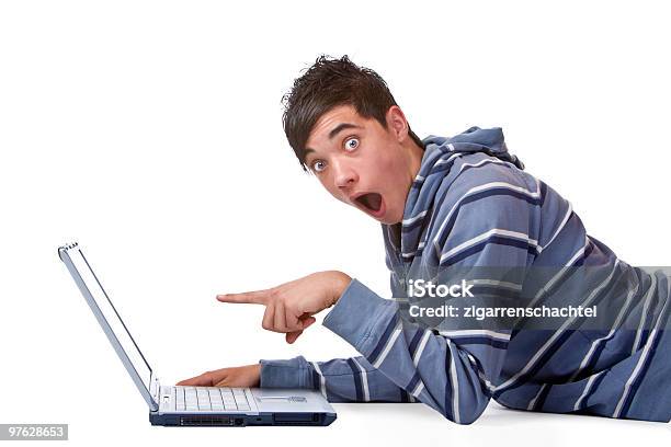 Young Male Student Found Something Surprising On Internet Computer Stock Photo - Download Image Now