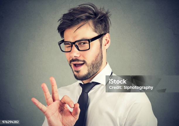 Ironic Man Showing Ok Gesture Stock Photo - Download Image Now - Humor, Salesman, Men
